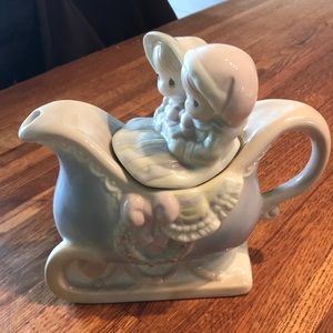 Precious moments tea pot.  Christmas motif